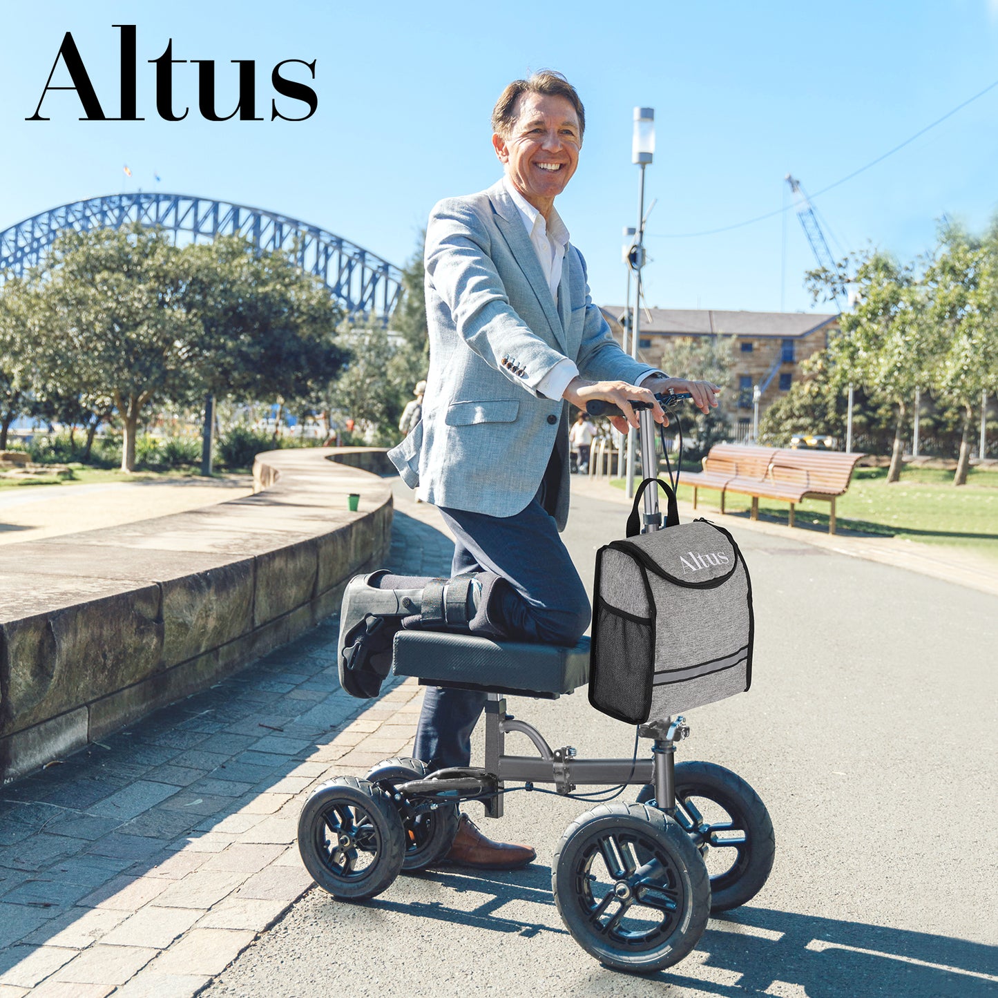 Man using Altus 12-inch knee walker near Sydney Harbour, demonstrating mobility aid suitable for urban or scenic environments