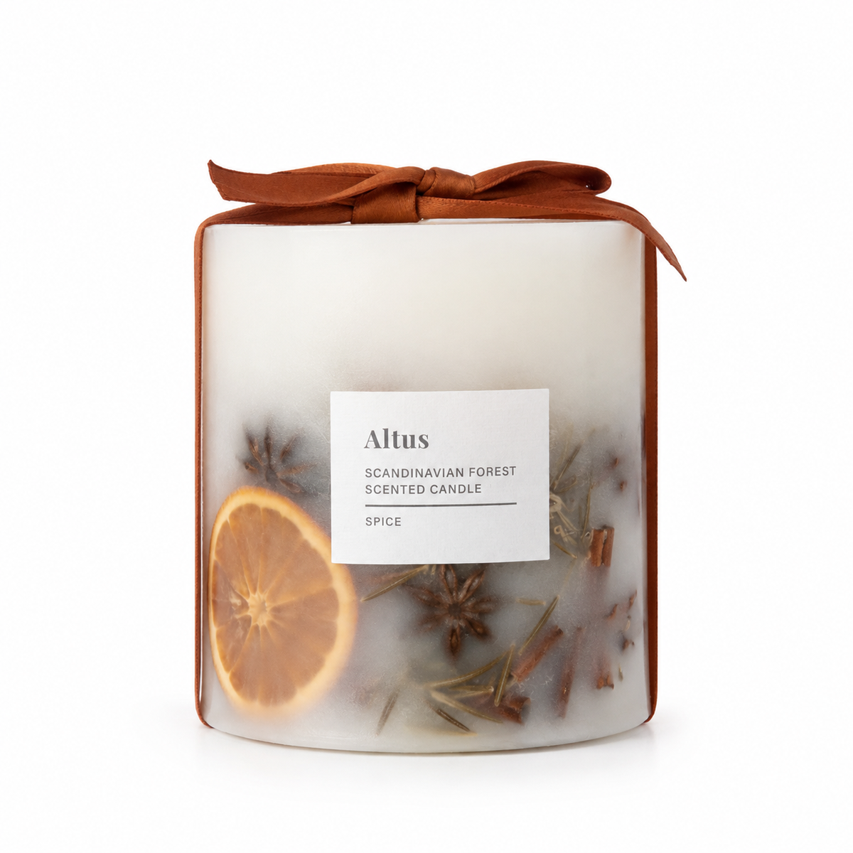 Altus Scandinavian Forest Scented Candle in a clear glass jar with a white wax body, featuring a brown ribbon bow on top, a white product label, and visible dried spices and a dried orange slice inside. Shot on a clean white background.