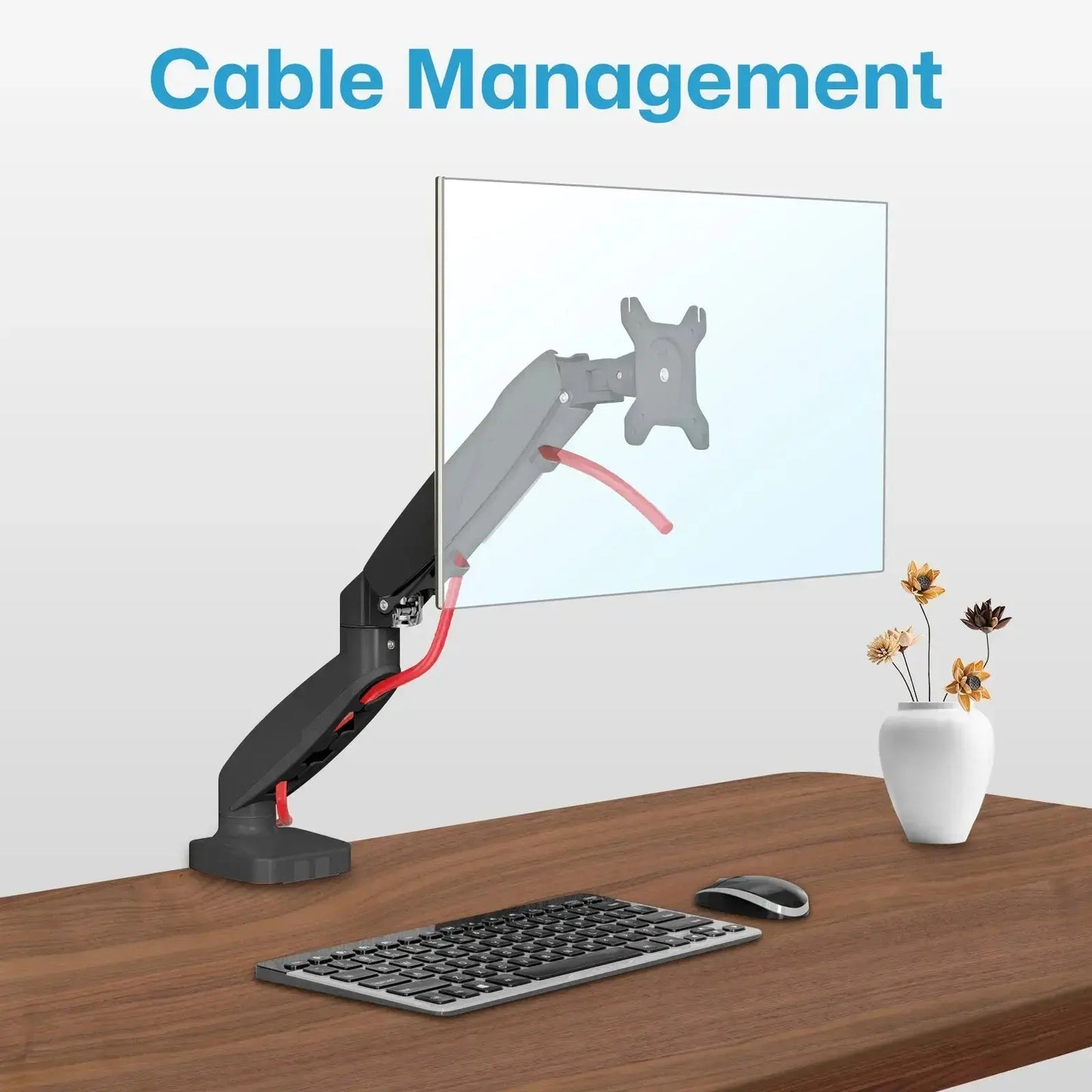 The image shows a computer monitor mounted on an adjustable arm attached to a desk. The arm has built-in cable management, as indicated by the red cables neatly routed through the arm. The desk also has a keyboard, a mouse, and a vase with dried flowers. The text "Cable Management" is prominently displayed at the top of the image. This image is relevant as it demonstrates an organized and clutter-free workspace, highlighting the benefits of using a monitor arm with cable management features.