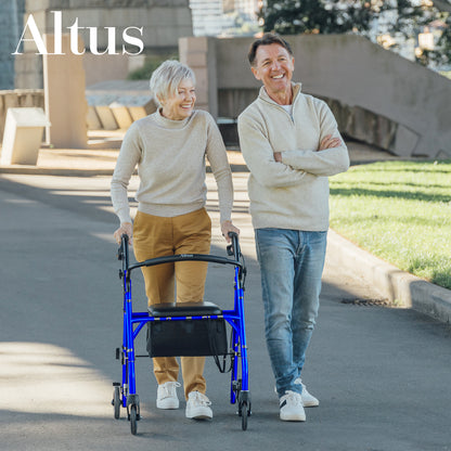 Two people walking outdoors with a walker, one of whom is using it.