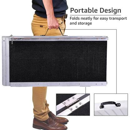 Man carrying folded Altus Portable Wheelchair Ramp, highlighting the ease of transport with a portable design.