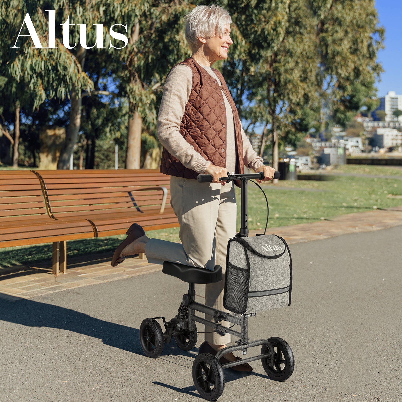 Altus Knee Scooter for elderly or adult women, shown in outdoor use on a footpath, ideal for post-surgery recovery