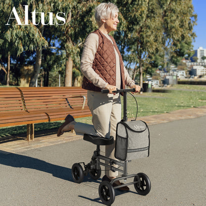 Altus Knee Scooter for elderly or adult women, shown in outdoor use on a footpath, ideal for post-surgery recovery
