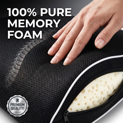 A close-up of a black mesh and memory foam sleep bag with a hand pressing on the surface to demonstrate its soft, responsive texture. A white zipper reveals a thick, pale yellow memory foam insert.