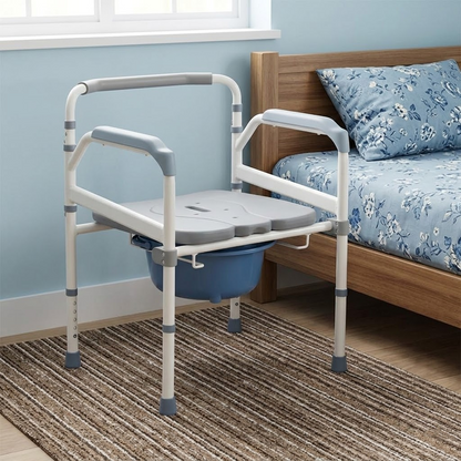 Bedside use of the Altus portable bedside commode, positioned next to a bed to provide convenient access for users with limited mobility.