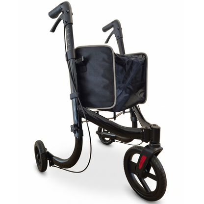 Side profile of the metallic black three wheel rollator showing the adjustable height handle mechanism and the narrow foldable frame structure for easy indoor navigation