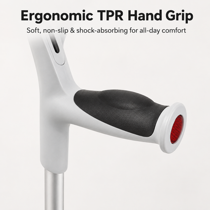 An ergonomic TPR hand grip on a white and silver cane, featuring a black textured foam pad and a red accent ring, with promotional text at the top.