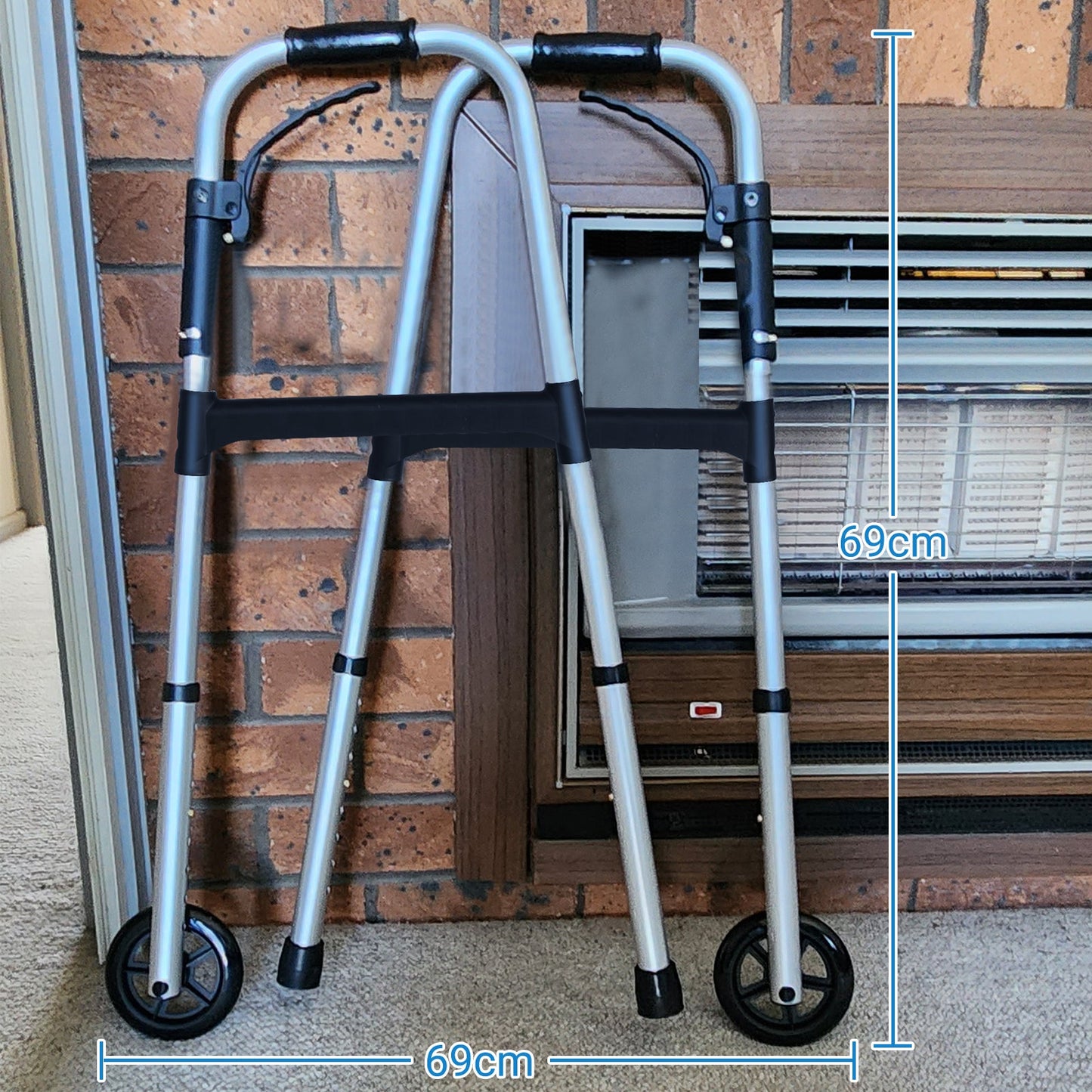 Compactly folded Altus Aluminum Walking Frame for easy storage and portability.