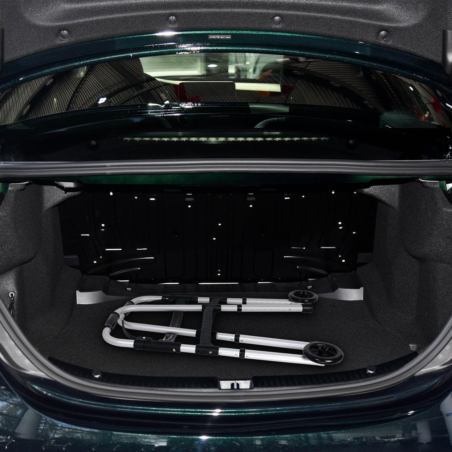 Altus Folding Walking Frame fits in car trunk, showcasing its lightweight and portable design