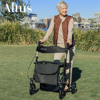 Experience the freedom of mobility with the Altus 8-inch Euro Rollator. Perfect for outdoor walks, this rollator ensures comfort and safety, as demonstrated by this happy user enjoying a sunny day in the park."