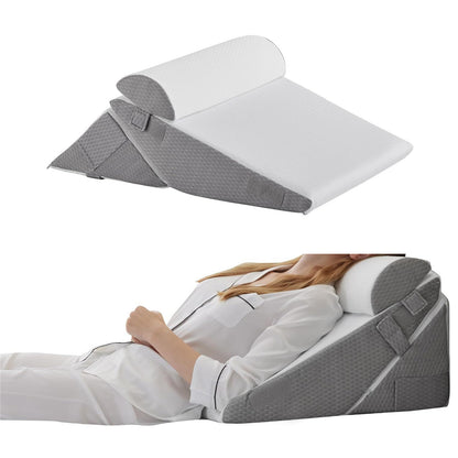 Gray and white wedge pillows with a person using them on a white background