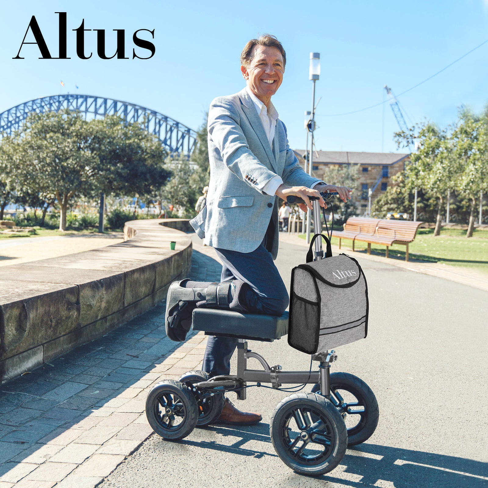 Man using Altus 12-inch knee walker near Sydney Harbour, demonstrating mobility aid suitable for urban or scenic environments