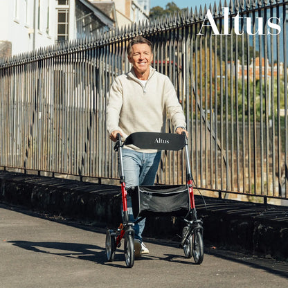 Close-up on the unique features of the Altus rollator, highlighting its ergonomic handle grips and user-friendly brake system designed for optimal safety and comfort