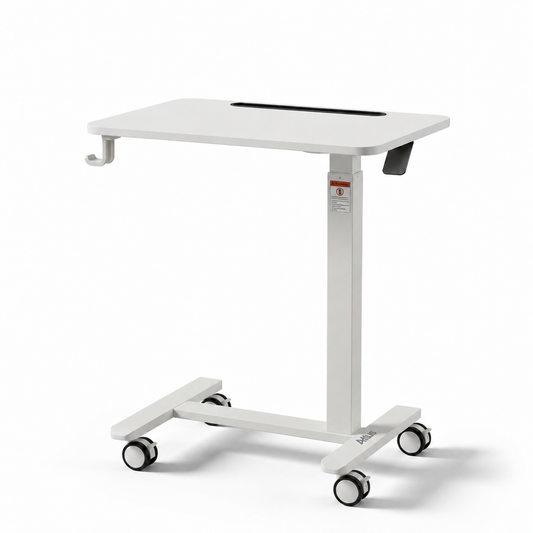 A white medical-style standing table with a rectangular top, built-in black storage slot, side hooks, and a wheeled base on casters, shown on a clean white background.