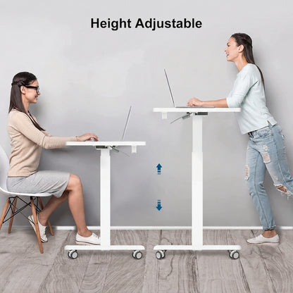 A height-adjustable standing desk shown in use with two women, one sitting at a lower height and one standing at a higher height, against a light gray wall with the text 'Height Adjustable' at the top.