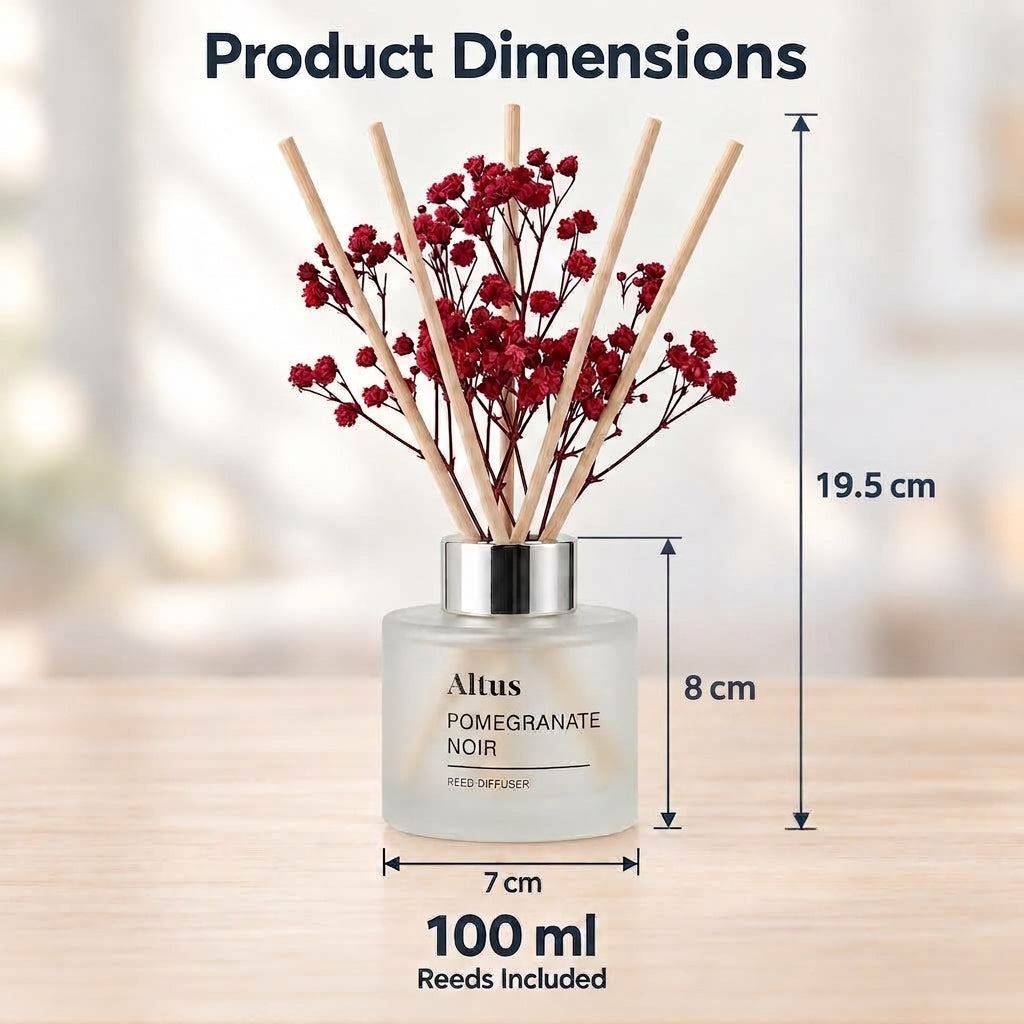 Altus Pomegranate Noir reed diffuser bottle with wooden reeds and red dried flowers, shown with dimension labels for height, width, and 100 ml capacity on a blurred indoor background.