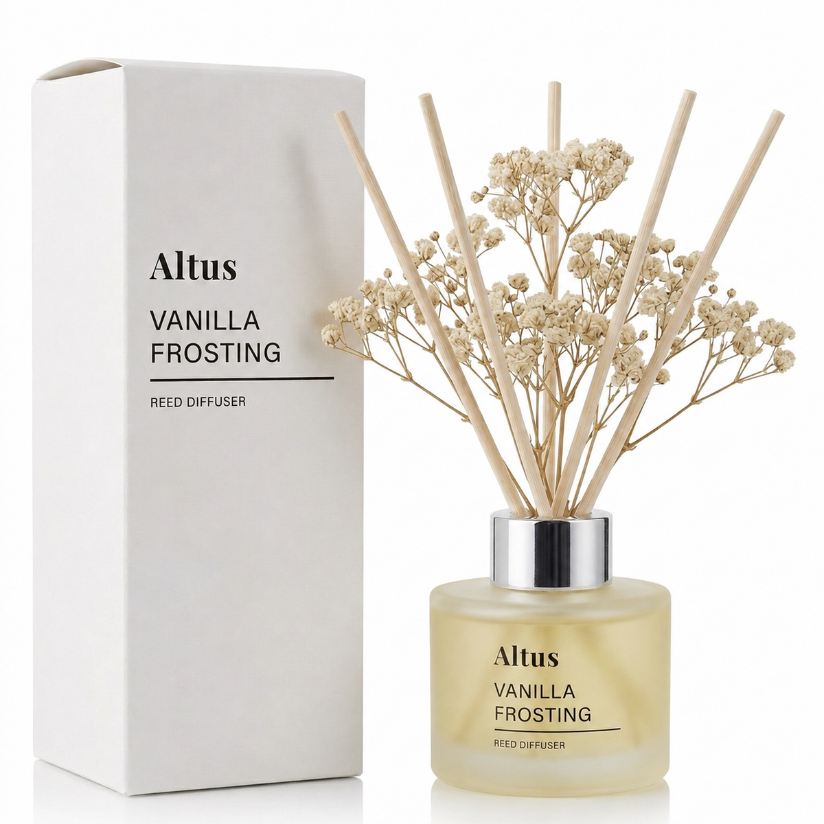 Altus Vanilla Frosting reed diffuser bottle with dried baby's breath stems and reeds, shown next to its white packaging box on a white background.