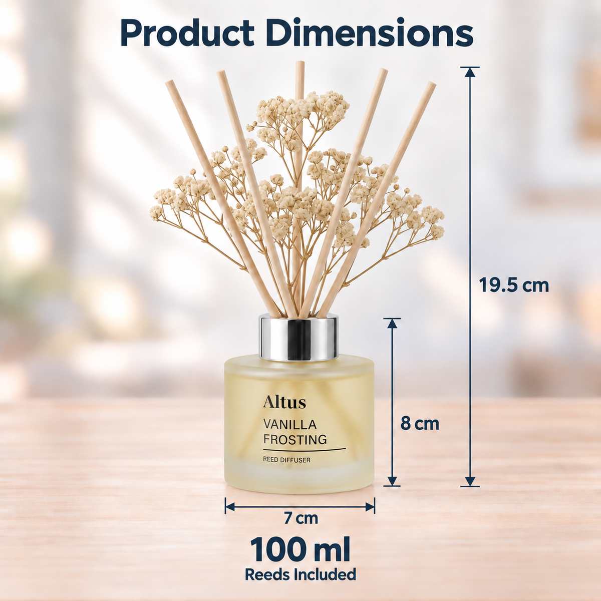 Altus Vanilla Frosting reed diffuser bottle with dried cream flowers and wooden reeds, shown on a light wood surface with overlaid product dimension labels: 19.5 cm height, 8 cm bottle height, 7 cm width, and 100 ml / reeds included.