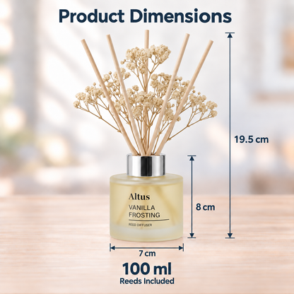 Altus Vanilla Frosting reed diffuser bottle with dried cream flowers and wooden reeds, shown on a light wood surface with overlaid product dimension labels: 19.5 cm height, 8 cm bottle height, 7 cm width, and 100 ml / reeds included.