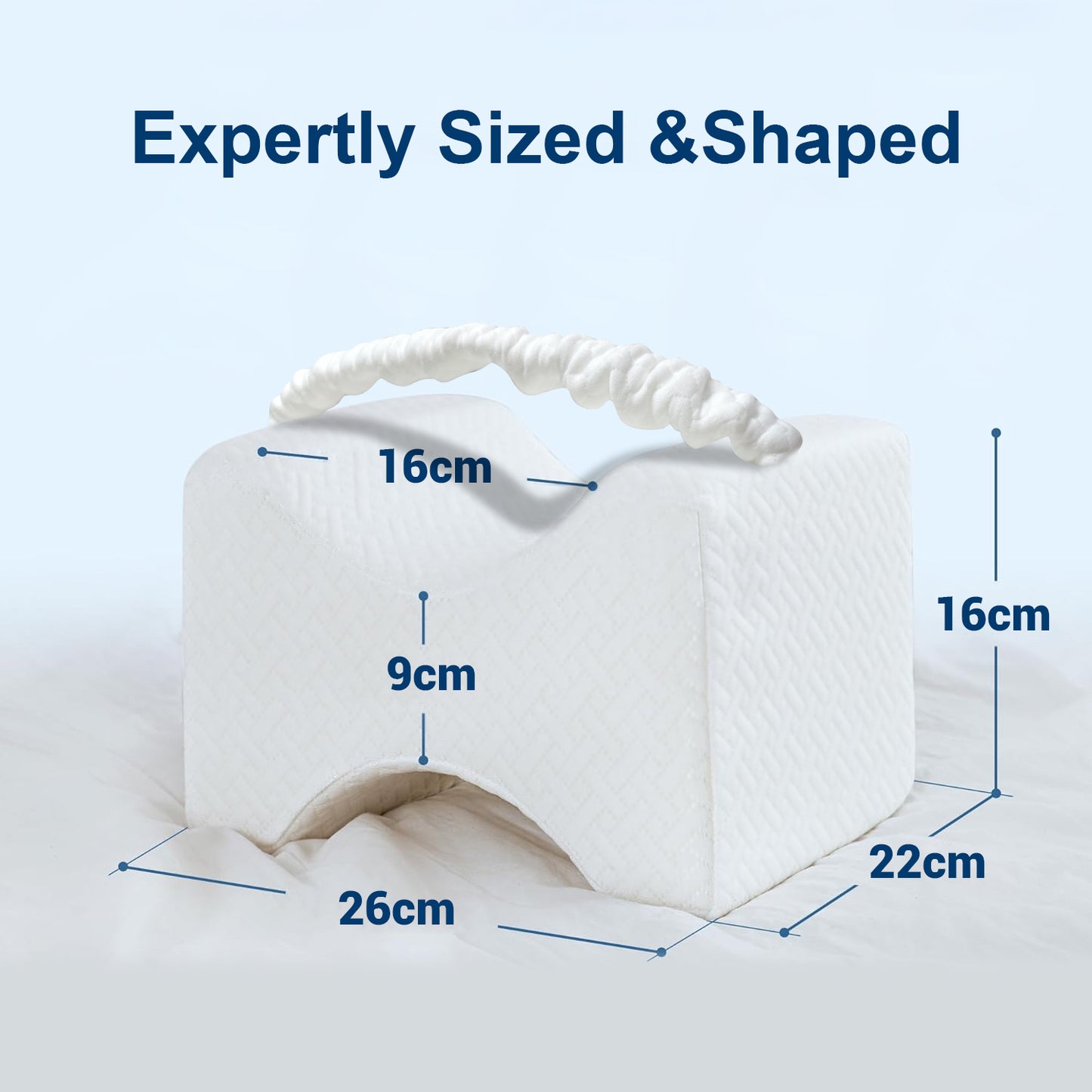White pillow with measurements on a light blue background