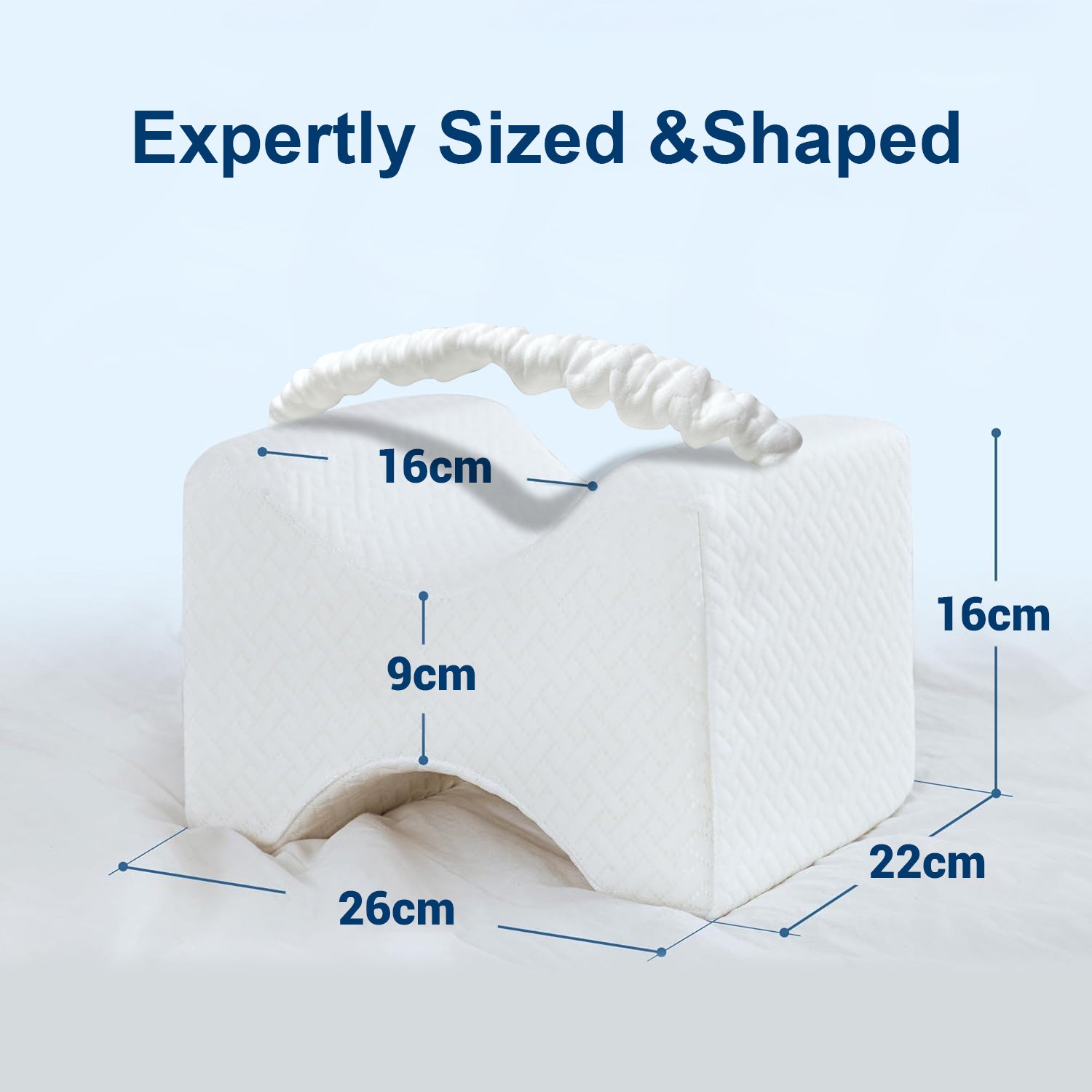 White pillow with measurements on a light blue background