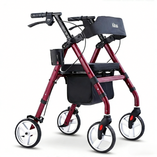 Red walker with black seat and handlebar on a white background