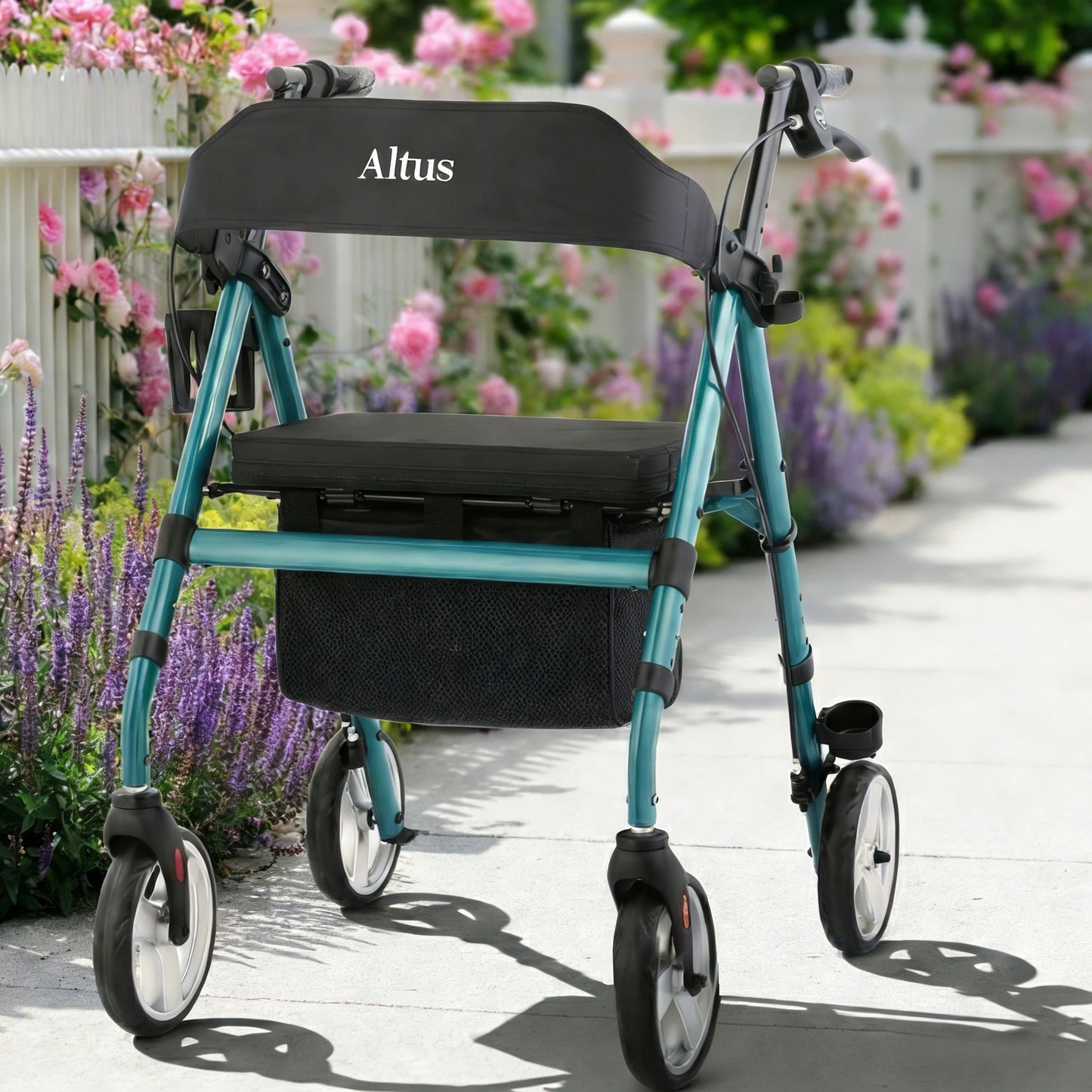 Blue and black Altus rollator on a garden path with flowers in the background