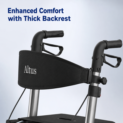 Close-up of a walker or rollator with a black padded backrest support strap and silver metal frame. Blue text at the top reads 'Enhanced Comfort with Thick Backrest.