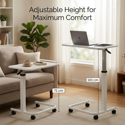 Adjustable height standing desk with white frame and black wheels, shown in a living room setting with a sofa and window. Text on the image reads 'Adjustable Height for Maximum Comfort' with height measurements labeled 71 cm and 101 cm.