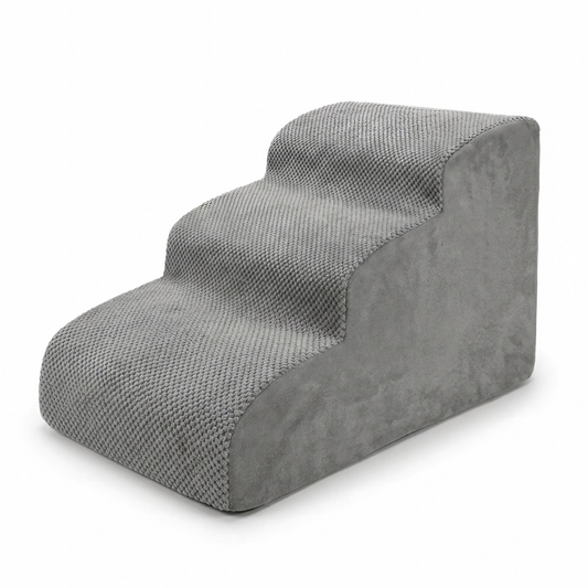 A three-step gray pet ramp with a textured woven fabric on the steps and a smoother suede-like side panel, shown on a white background.