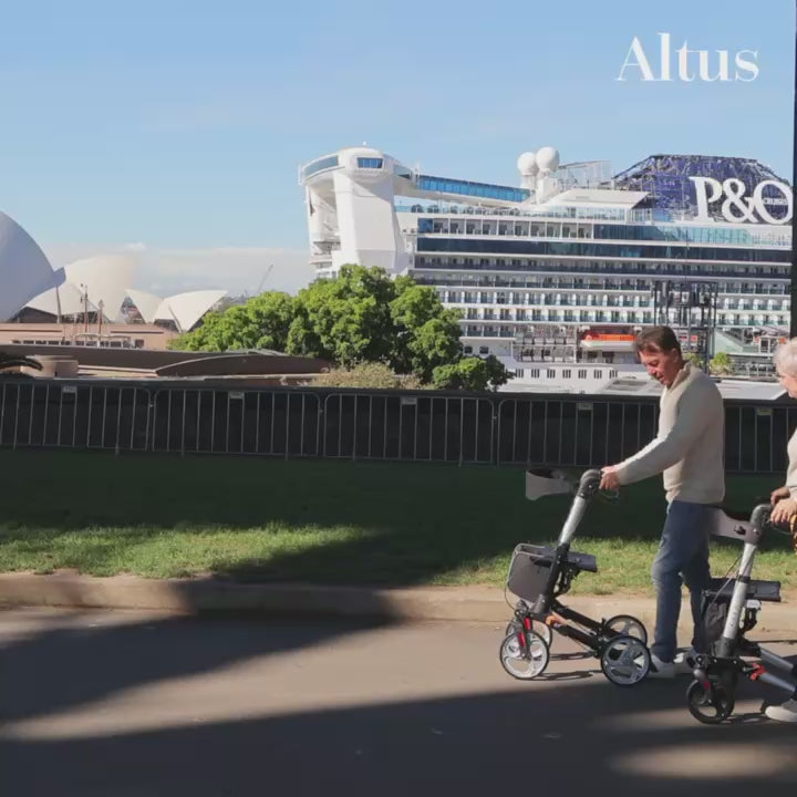 Altus mobility aid, used on Sydney-style city streets, easily switches between walking and pushing modes for hassle-free outings.