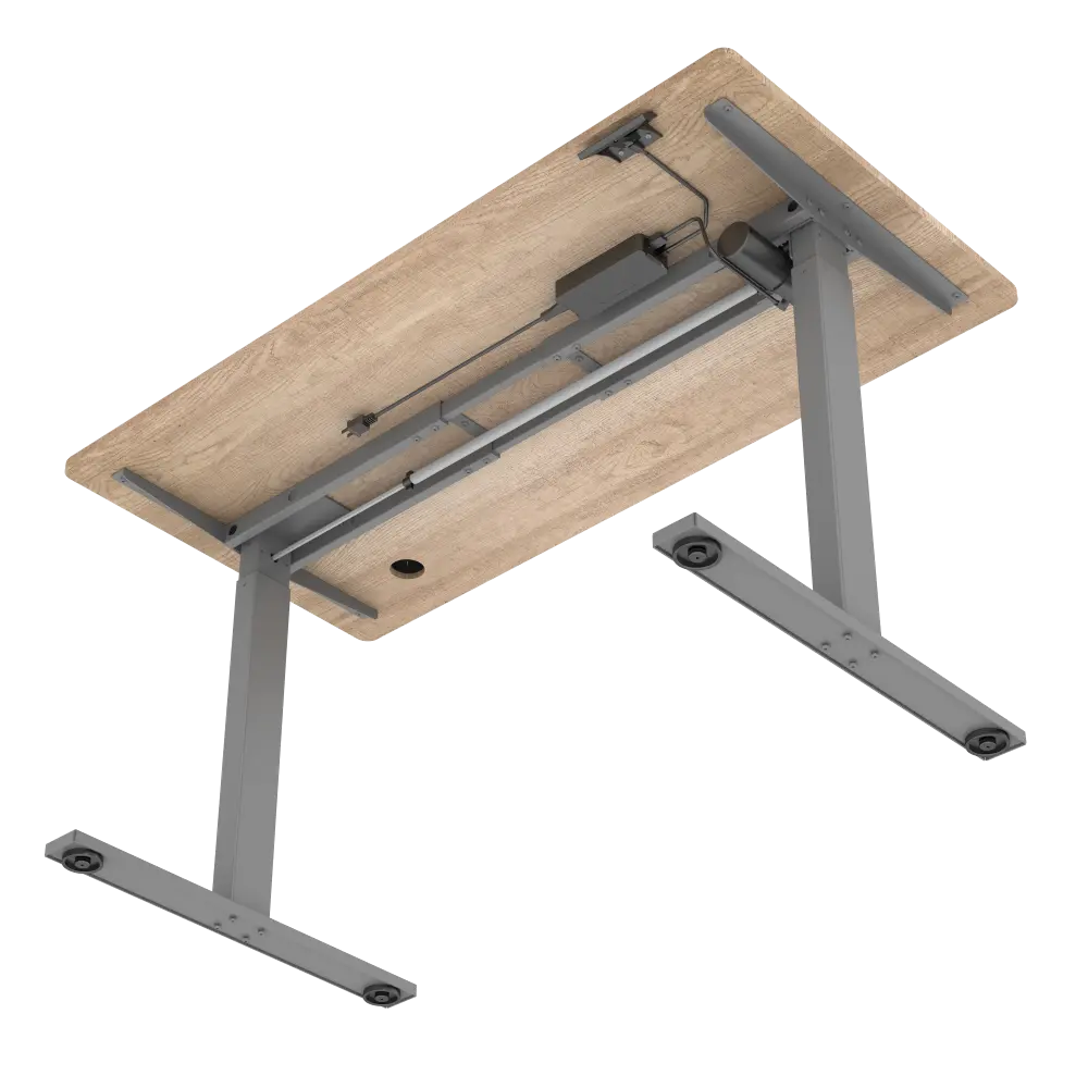 A view from underneath the motorized adjustable desk, showing the frame's mechanisms and electrical components for height adjustment.