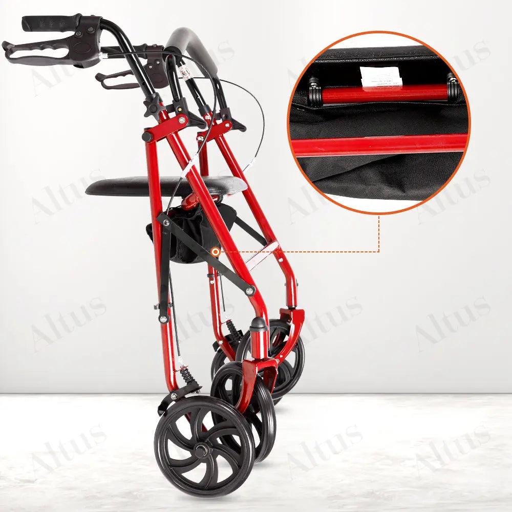 Red rollator walker in a folded position, showing the compact storage design.